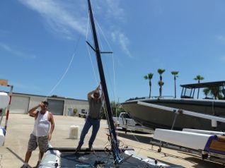 At this point rotate the mast 180 degrees back to a normal position and continue to hold the mast forward.