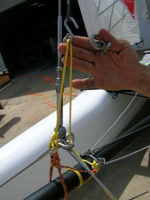 If the outhaul is applied too tight prior to the down haul, the sail will be pulled out of the mast track. Repeating this procedure can damage your mast. 21.
