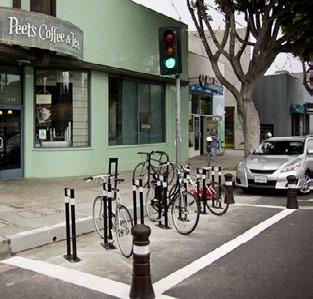 Tool #17: Wayfinding Signage Tool #18: Bike Corrals Transforms on-street space into bicycle parking for 4 to 12 bikes in areas otherwise used for vehicle loading or parking.