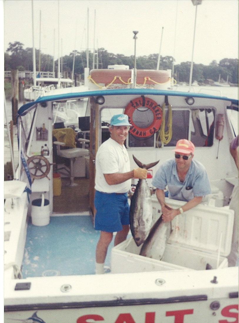 Captain Uncle Bob Morrissey is holding up a nice tuna that he caught, most likely while fishing in one of his secret spots!