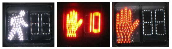 4 Figure 1.2. Pedestrian countdown signal indications. From left: WALK, FDW and DW. The clearance interval displays the countdown timer concurrent with Flashing UPRAISED HAND or Flashing DON T WALK.