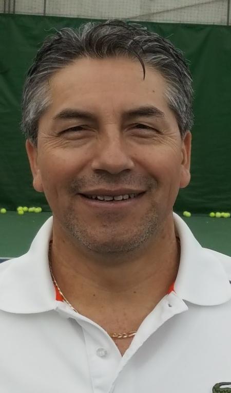 Coach Enrique Llerena Enrique has been teaching tennis for 38 years, beginning back in his home country of Ecuador. Upon arriving to the U.S.