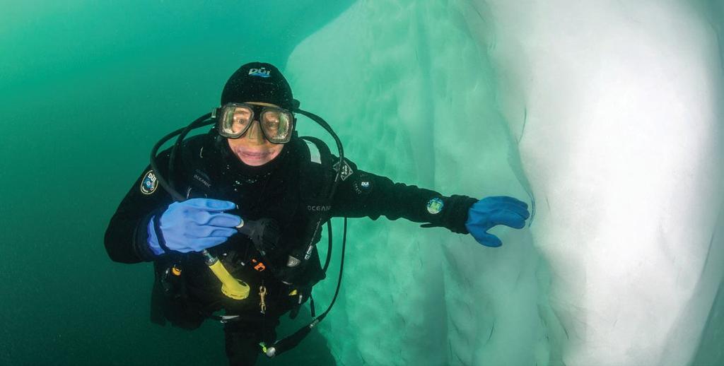 UNDERWATER ADVENTURES WITH ECO-PHOTO EXPLORERS The undersides of the iceberg are carved by ocean waters (Photo by Byron Conroy) An Intimate Exploration of Greenland Article and Photos by Michael