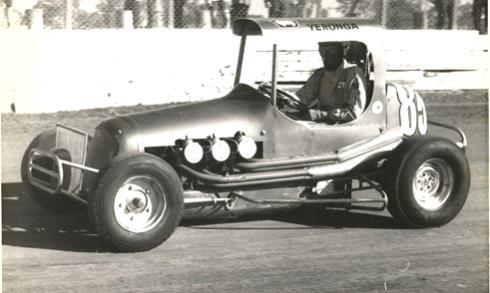 This photo above shows A6 Norman Randall behind the wheel of his EH Holden Saloon Car when he was racing at the Caboolture Speedway from 26th July 1976 to