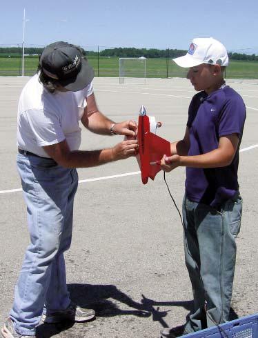 In Formula 40, senior Bobby Poisson placed fourth at 141.95 mph. Bobby and his dad Bob spent a great part of the day working on propellers. Their work gained them more than five mph.
