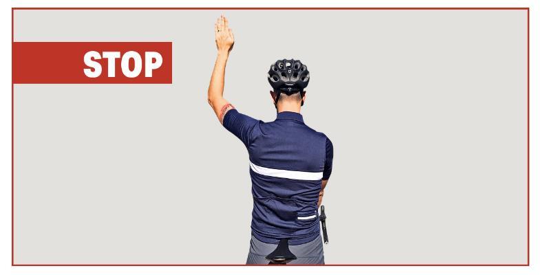 On a large group ride, raising your hand above your head may be a more appropriate option because it is more visible to cyclists several positions behind.