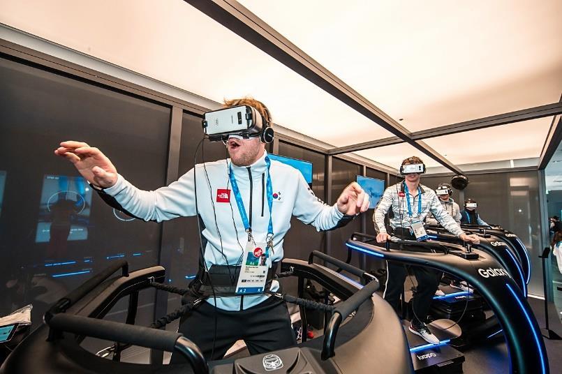 Team members from the South Korea Men s National Ice Hockey team show off their skills with winter sports skills by participating in the Galaxy Fitness Alpine Skiing at the Samsung Olympic Showcase