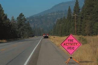 Initial Attack Engine or Crew Operations Along a Roadway Application Notes The AHEAD sign may be omitted if the incident vehicle or activity is behind a barrier, more than 24 inches behind a curb, or