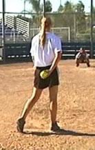 Essential Softball Pitching Grips Page 7 2. Keep the hands apart and at your sides with the ball in your bare hand. This action shows the batter that you are getting ready to pitch. Stance 1.