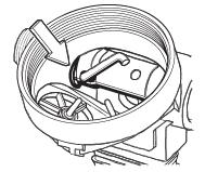 Pass the valve body through until only 2-3 threads protrude outside the opposite side of the box bottom, and the recessed pinhole remains visible.