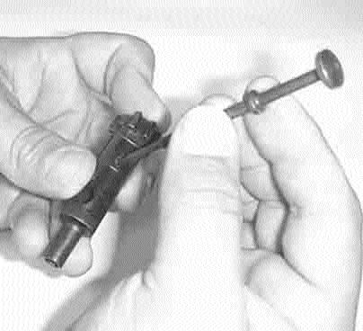 bolt carrier (B-2). Remove the firing pin. Remove the bolt cam pin (B-9).