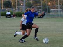 Freshman Evelyn Gomez (left) fights for a ball in SCC's 3-0 victory over Orange Coast College.