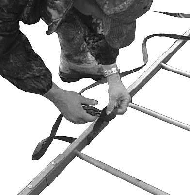 Climb up and IMMEDIATELY attach your safety line above your seating position. Loop the rope around the tree and connect your safety harness to the prussic hitch as shown in Figure 23.