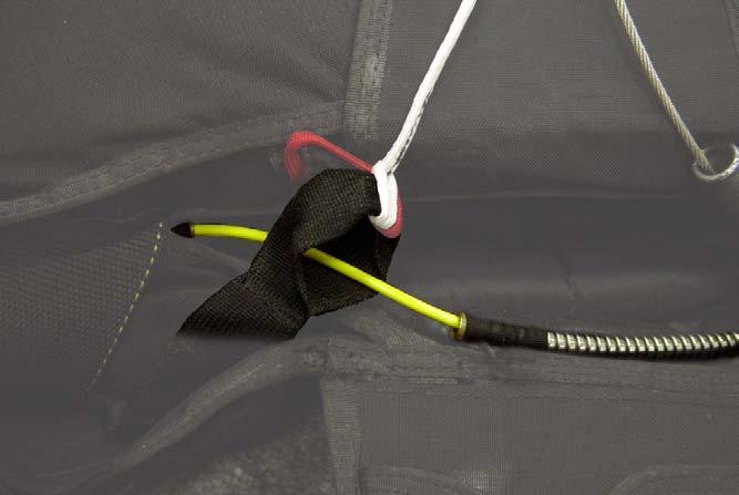 Make sure the left hand (exposed) yellow breakaway cable passes through the Collins Lanyard loop at the end of the RSL.