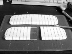 Make a rib template from a manila folder to draw the rib lines (so the end of the template can be bent to conformto the rounded shape of the