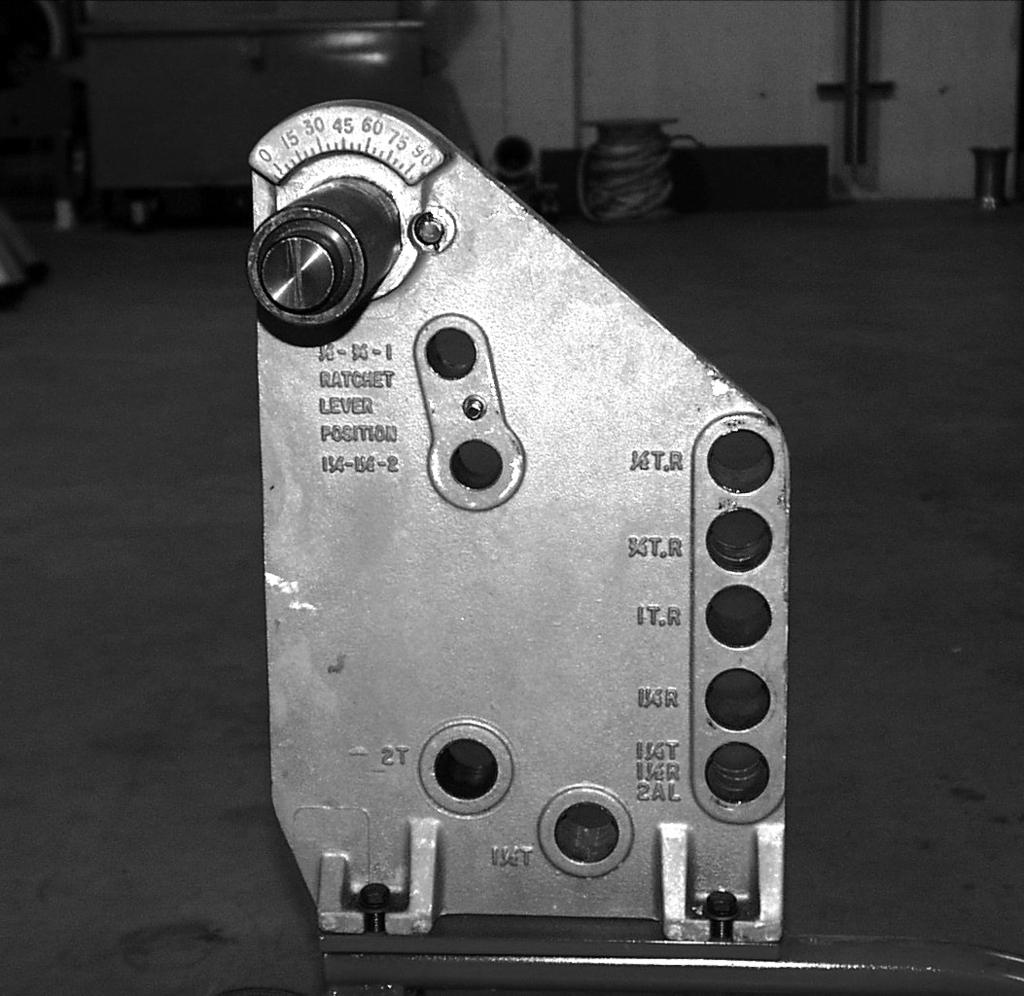 Bender Set-Up A. Handle 1. The bender frame has two mounting holes for the ratchet handle and a locating pin in the area between the two holes, figure 1. B. Shoe Installation 1.