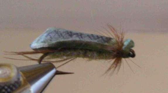 Chironomid Use a Tiemco 2457 or a 200R. Take the straight hook and bend the front part down. He used a tool he had made.