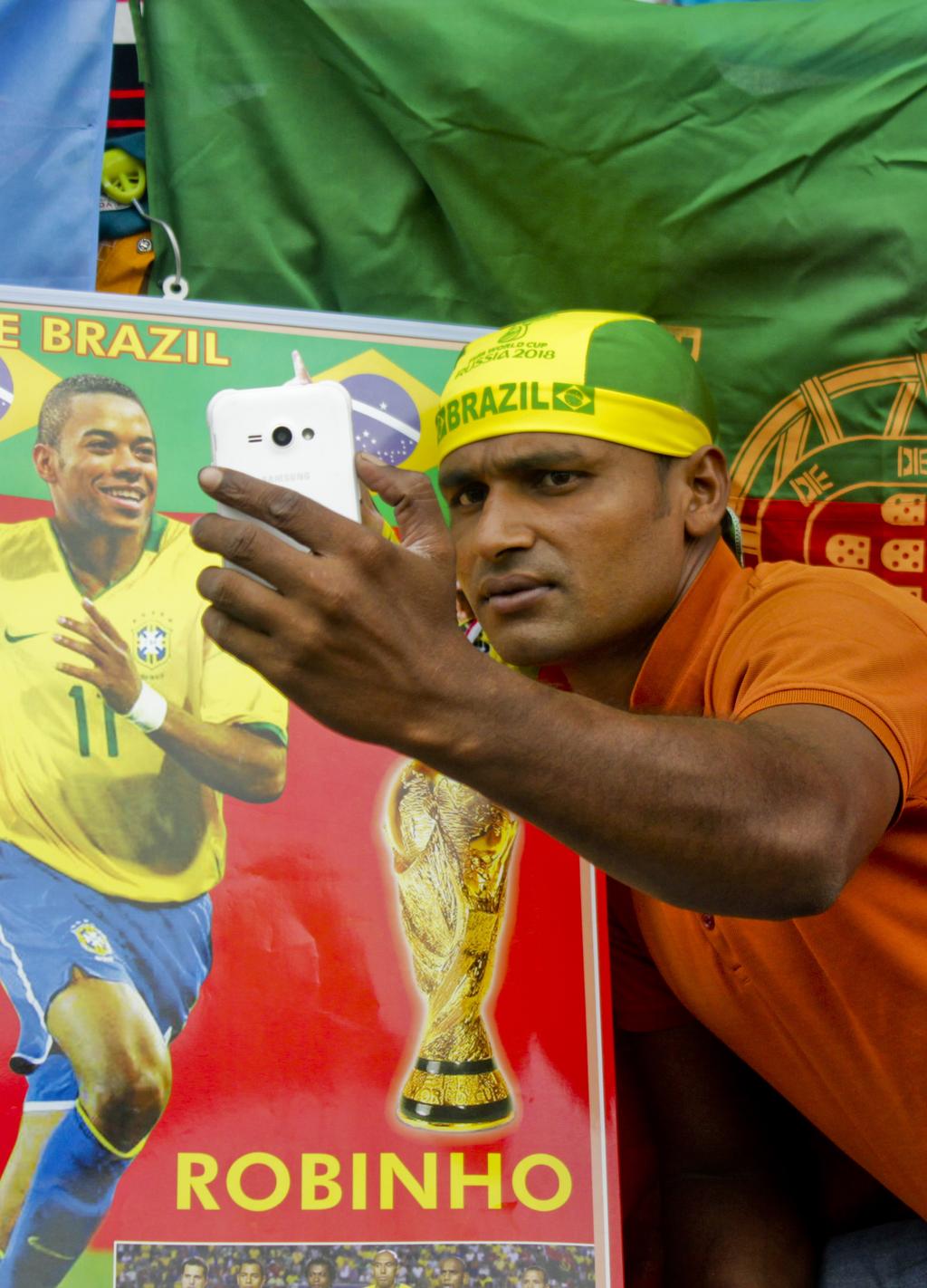 1 4 Brazil fan taking a selfie in Dhaka, Bangladesh, on May