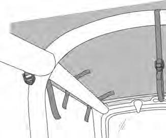 The goal in this step is to wrap the long center strap around the vehicle s sport bar (main hoop) to bring it forward and through the footman loop on the windshield.