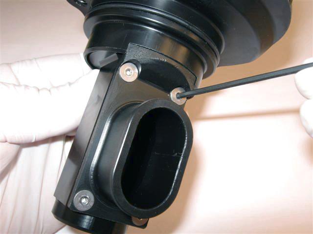 Unscrew valve cover (11) counter