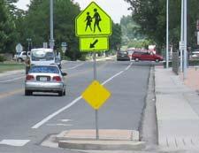 Raised pedestrian crossings can be particularly effective at right turn bypass islands and school crossings.