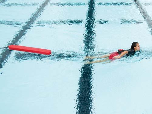 If necessary, reposition the rescue tube in front of you before contacting the victim. Figure 6-3A Modified front crawl approach In shallow water, it may be quicker or easier to walk to the victim.