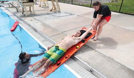 REMOVAL FROM THE WATER Extrication Using a Backboard at the Pool Edge continued 5 6 Once the victim is centered on the backboard, the assisting responder(s) signals that they are ready to remove the