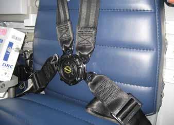 The seat belt/harness is a four-point attachment with a twist-to-release buckle. Photo courtesy Steve Wilson Most windows can operate as emergency exits.
