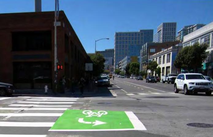 TURNING MOVEMENTS 2- Stage Turn Queue Boxes Two-stage turn queue boxes allow bicyclists to make left turns at multilane intersections from a right-side separated bike lane, or right turns from a