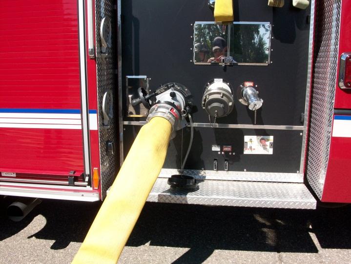 The apparatus operator will either use hand signals (if distance and line of sight allow) or communicate over the radio asking the firefighter still at the hydrant to Charge the supply line. Fig.
