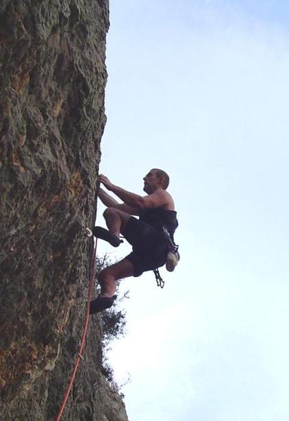 Richard Davies on a repeat of Spanish Holiday (6c+) 3. Crazy Crazy 10m. Climb from block and step right. Pull straight through the bulge and continue more easily up the pleasant wall to the belay.