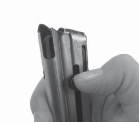 Press magazine catch and remove empty magazine (fig. 5). Use the side-mounted button to push the follower down and insert the cartridge under the magazine lips (fig. 6). Do not use excessive force.
