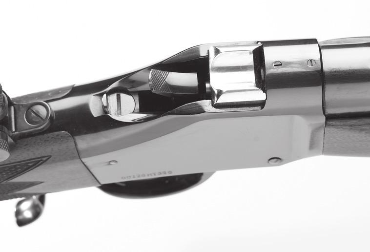After firing, the lever can be rotated downward which lowers the breech block and the hammer, and at the same time extracts or ejects, (depending on the model) the fired cartridge.