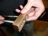 Step 3. Turn the second diamond wire in the brass diamond adjuster block.
