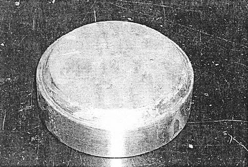 Figure 18: Measurement of specimen height Figure 19: Consolidation cutting ring Figure 20: Tightening reaction bolts 2.4 Cut the ends of the sample to form a 1 inch specimen thickness.