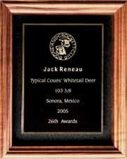 shadow box of solid black walnut lined with black felt. Your plaque will include your name, category, score, location, year, and Awards Period.