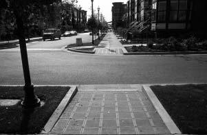 Curb ramps must be installed at all intersections and midblock locations where pedestrian crossings exist, as mandated by federal legislation (1973 Rehabilitation Act).