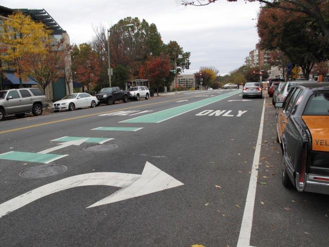 At two-way protected bike lane crossings, a dashed centerline should be used within the crossing to separate the two directions of bicycle traffic.