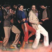 The dancers retained the original five-part phrasing, but replaced the Part 5 side step with stopping in place. (Then they invented a second part for the film, to make it more interesting).