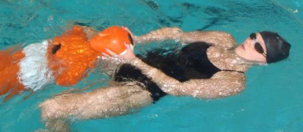 Double-hand head or chin carry Competitors swim on their backs and may use any kick or stroke.