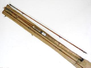 $100 - $150 500 English split cane river fishing rod with original canvas bag.