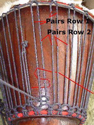 How to tune a Djembe Look at rope pairs here. I always cross the ropes that almost touch as the pass through the same loop of the bottom cradle as pairs for the first row.