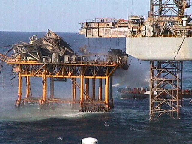 Ensco 51 collapsed sub-structure & derrick Ensco 51 Intermediate flow at A-13 wellhead Flow at