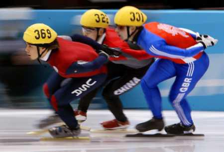 Speed Skating Jerry Lampen/Reuters Why do speed skaters crouch down and put their hands behind them?