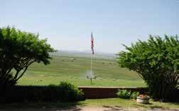 The ranch improvements include three main homes, barns, corrals, shops, and are the focal point of the Headquarters Parcel, which is situated on a ridge that