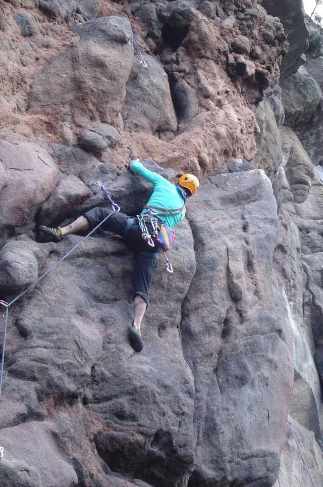 - 8 * Fire Brigade (16) 15m Start in the middle of face then traverse out to left arete. Climb through steep ground and onto face just left of arete. Climb arte and face to top. DBC belay. (Pro.