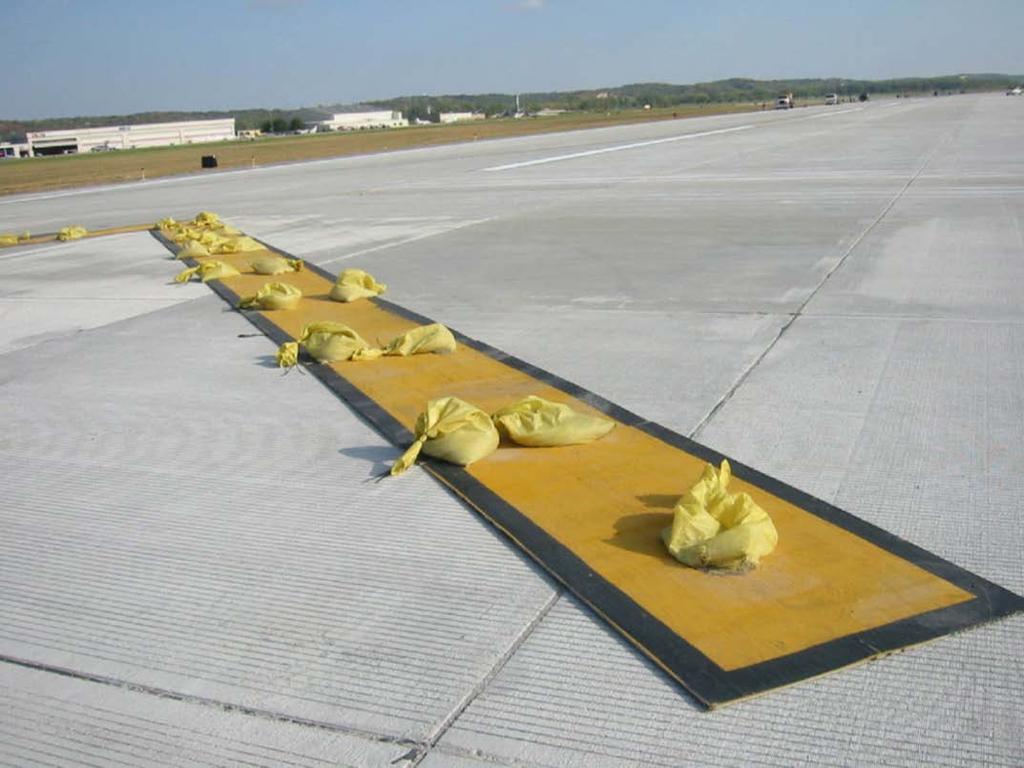 Temporary Runway Thresholds This is an example of a temporary chevron where a black