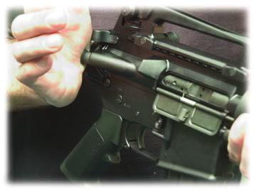 Pull charging handle fully to the rear (Fig. 21). Release charging handle. Never ride the charging handle forward.