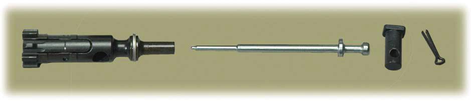 Lightly oil the gas key (Fig. 50). Clean carbon and powder residue from vent holes and outer and inner surfaces of the bolt carrier.