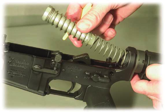 As you install the bolt carrier, align the gas key with the channel in the Fig.
